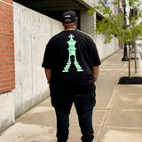 “ CHESS NOT CHECKERS “  TEE (BLACK/GREEN)
