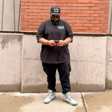 “ CHESS NOT CHECKERS “  TEE (BLACK/GREEN)