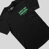 “ CHESS NOT CHECKERS “  TEE (BLACK/GREEN)